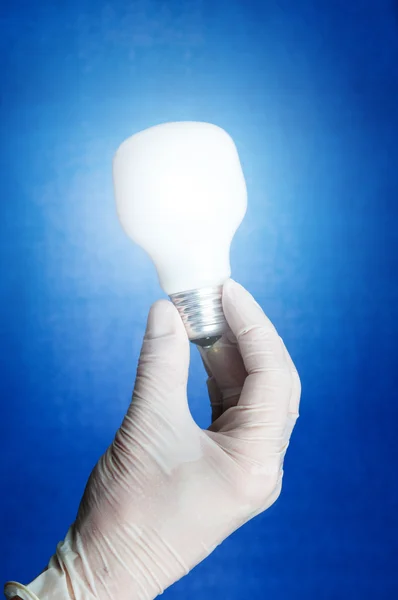 Light bulb in hand — Stock Photo, Image