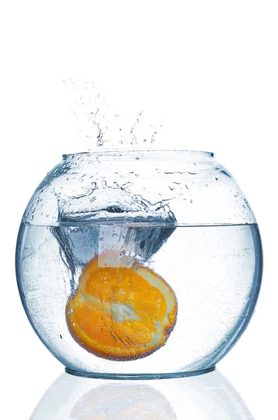 Orange falls under water with big splash — Stock Photo, Image