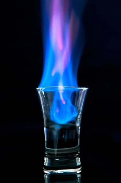 Flaming vodka Stock Image