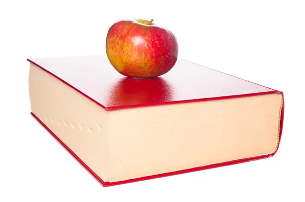 Dictionary and apple closeup on white background — Stock Photo, Image