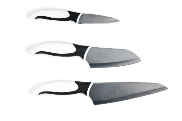 Três facas de mesa no fundo branco — Fotografia de Stock