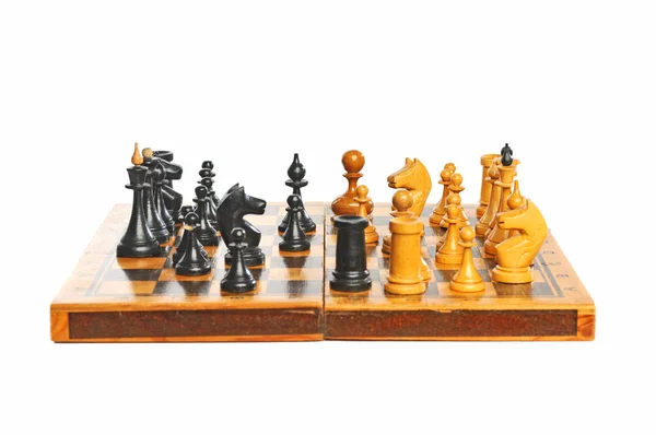 Chess battle on old wood board — Stock Photo, Image