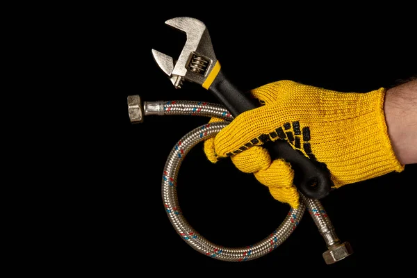 Kesztyű Kéz Tartó Állítható Kulcs Tömlő Elszigetelt Fekete Alapon — Stock Fotó