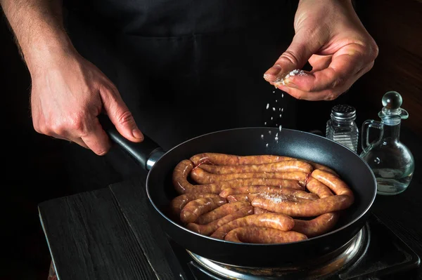 Chef Adds Salt Pan Raw Meat Sausage Preparation Cooking Sausages — Stock Photo, Image