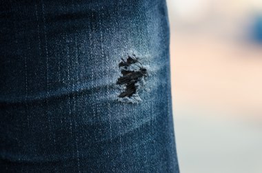 closeup of torn jeans clipart