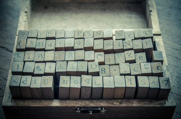 Alphabets stamp in the box. — Stock Photo, Image