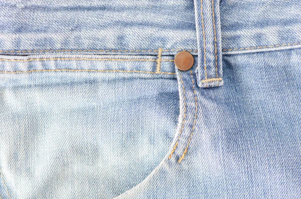 Worn blue denim jeans texture — Stock Photo, Image