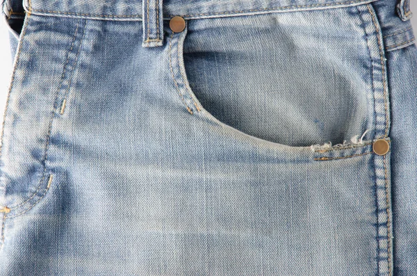 Gedragen blauwe denim jeans textuur — Stockfoto