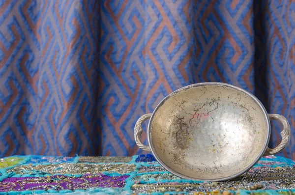 Moroccan metal bowl placed on a table — Stock Photo, Image