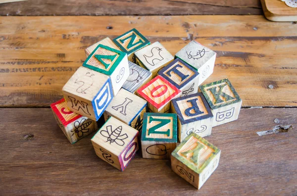 Wooden blocks on wooden table — Stock Photo, Image