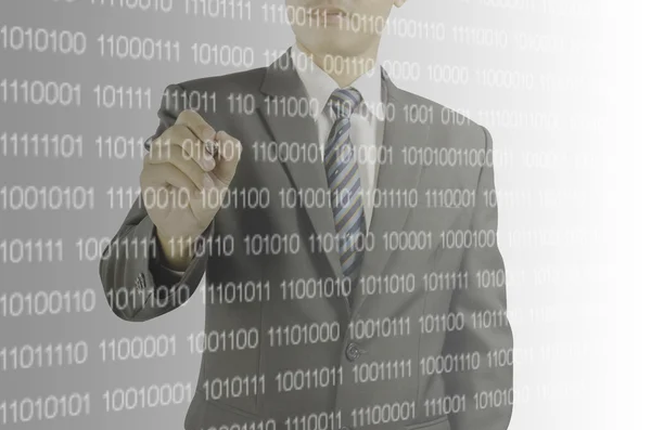 Businessman pointing pen at the digital code — Stock Photo, Image
