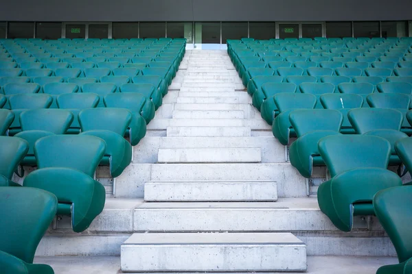 Green plastic seats  at modern stadium — Stock Photo, Image