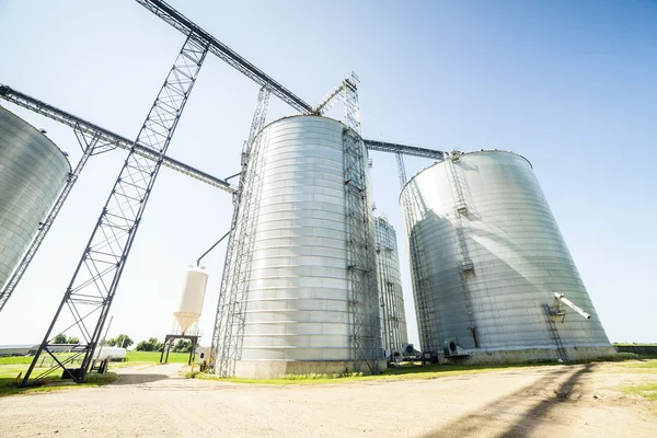 Silver, shiny agricultural silos — Stock Photo, Image
