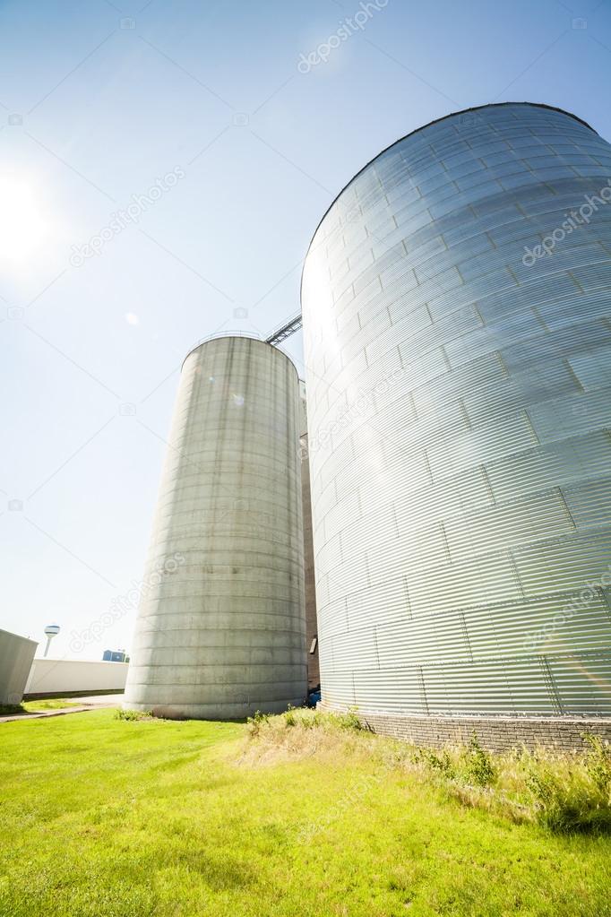 Silver, shiny agricultural silos
