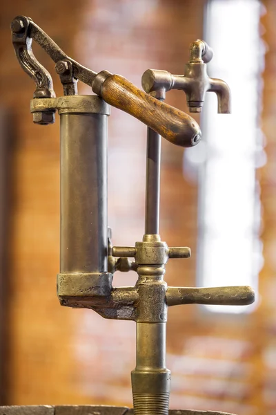 Vintage tap to barrel full of alcohol — Stock Photo, Image