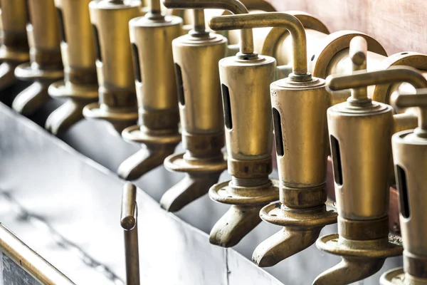 Copper tap in beer brewery — Stock Photo, Image