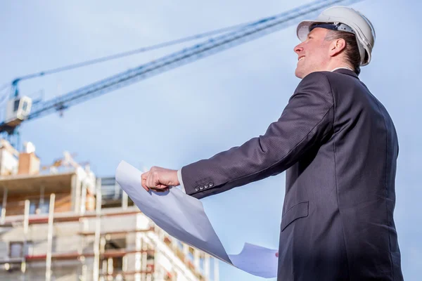 Construction manager with blueprints — Stock Photo, Image