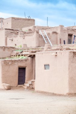 Taos Pueblo remarkable example of a traditional type of archit clipart