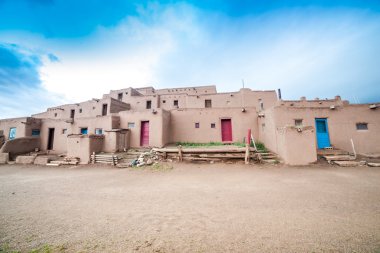 Taos Pueblo is example of a Pueblo Indians  architecture clipart