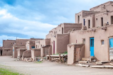 Taos Pueblo is example of a Pueblo Indians  architecture clipart