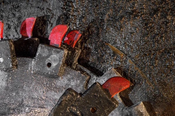 Mine excavator facing coal wall — Stock Photo, Image