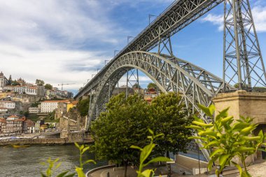 Historic Porto cityscape with iconic Luis bridge. View from the Vila Nova de Gaia, Portugal