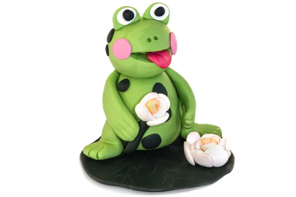 Frog figurine made of polymer clay on a white background . — Stock Photo, Image