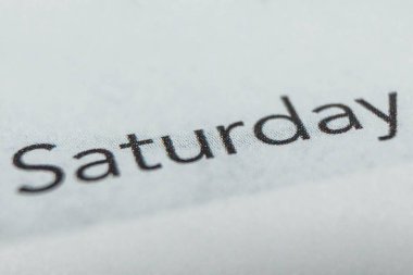 Cumartesi, haftanın günleri. Aylık planlayıcının siyah ve beyaz makro görüntüsü - Görüntü