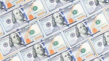 Yüz dolarlık banknotların yakın plan çekimi maliye, yatırım ve ekonomik temalar için ideal, zenginlik, başarı ve finans hizmetleri öneren dokulu bir geçmiş yaratır..