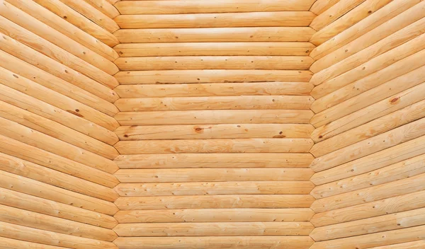 Drie muur gemaakt van houten logboeken close-up. Rechtenvrije Stockafbeeldingen