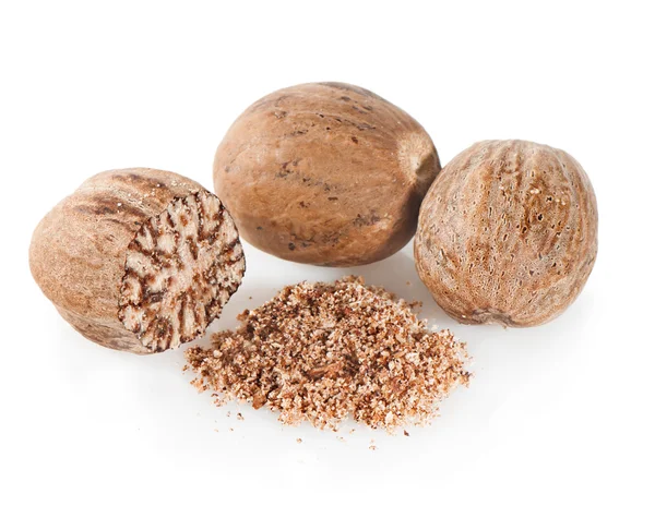 Nutmeg on a white background close-up. — Stock Photo, Image