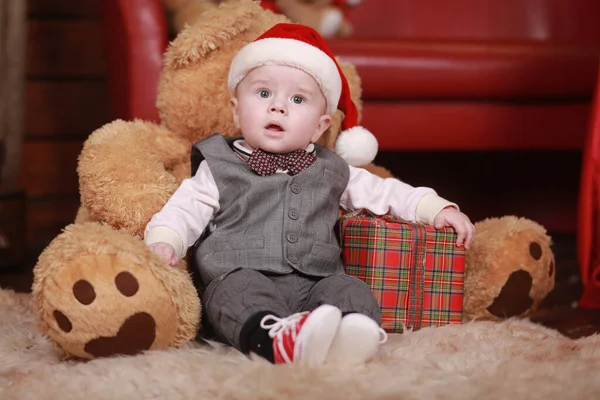 Cute Baby Boy Santa Hat Big Teddy Bear Christmas Gifts — Stock Photo, Image