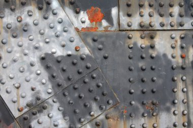 Rivets and rust horizontal industrial steel girder background clipart