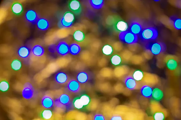 Luces Borrosas Guirnalda Navidad Bokeh Sobre Fondo Dorado —  Fotos de Stock