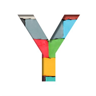 Çok renkli plastiksi yazı tipi. Y harfi renkli plastik parçaların arka planında kağıttan kesilmiş. Bir dizi hacimsel renk yazıtipi.