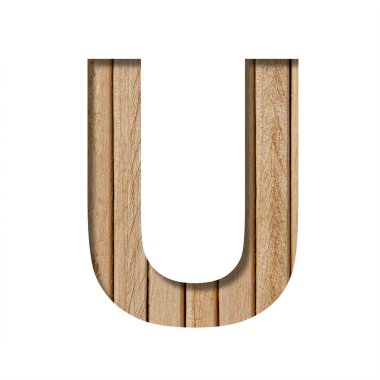 Işık tahtasındaki yazı tipi. U harfi, dikey ahşap bir zeminde kağıttan kesilmiş. Tahta yazı tipleri kümesi