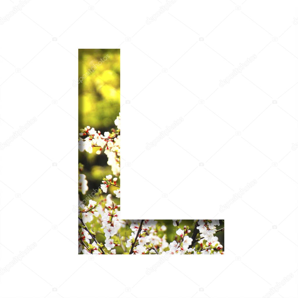 Spring sunny font. The letter L cut out of paper on the background of blooming cherry on a sunny spring day. Set of decorative natural fonts.