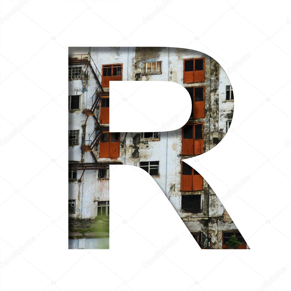 Font on an abandoned industrial building. The letter R cut out of paper on a background of windows and doors of an abandoned industrial building. Set of decorative fonts.