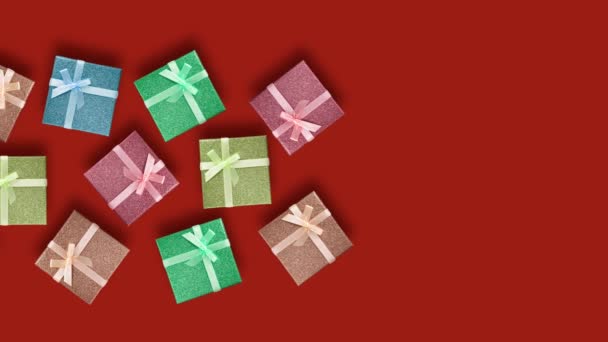 Christmas Gift Boxes Move Left Right Dark Red Background Advertising — Stock Video