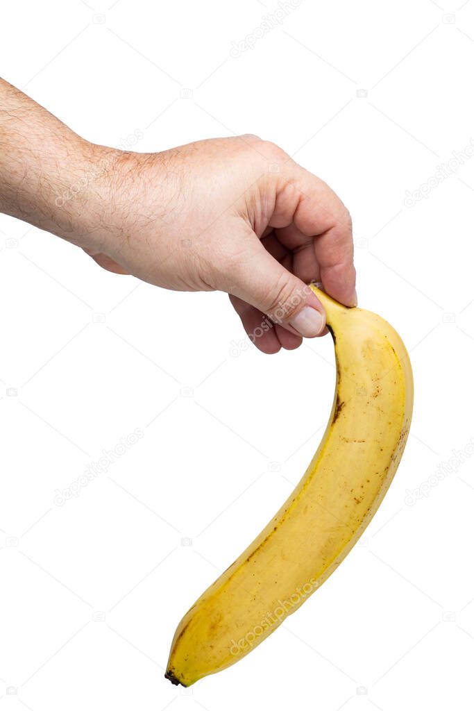Ripe yellow banana in man hand on white isolated