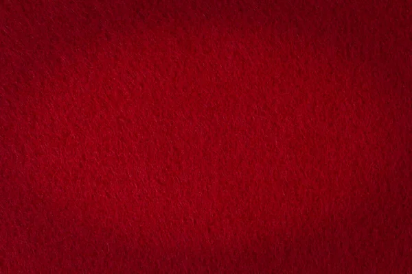 Arka plan olarak vignetting efektli koyu kırmızı dokuyu hissetti.