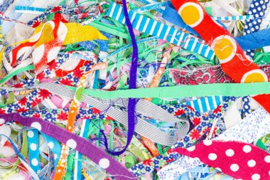 Ev sanatı veya yaratıcılık için kumaş kırıntıları, arka plan olarak paçavra dokusu