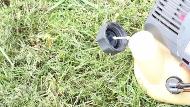 Hand Man Work Overalls Unscrews Fuel Tank Cap Trimmer Lawn — Stock Video