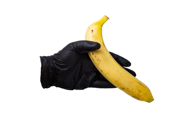 Mão Luva Preta Segura Banana Amarela Madura Close Isolado Espaço — Fotografia de Stock