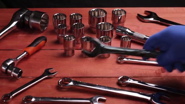 Car Mechanic Blue Work Gloves Takes Different Wrenches Table Repair — Stock Video
