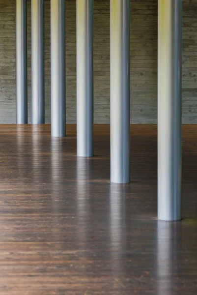 metal column and wooden floor in modern architecture