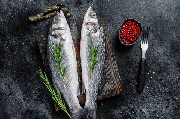 Raw Seabass Fish Cutting Board Spices Herbs Black Background Top — Stock Photo, Image