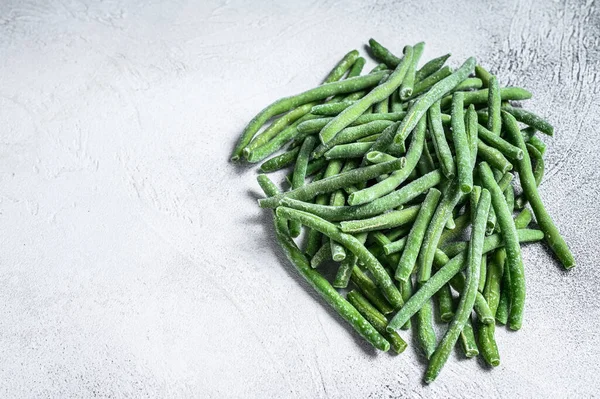 Bevroren Groene Bonen Witte Keukentafel Witte Achtergrond Bovenaanzicht Kopieerruimte — Stockfoto