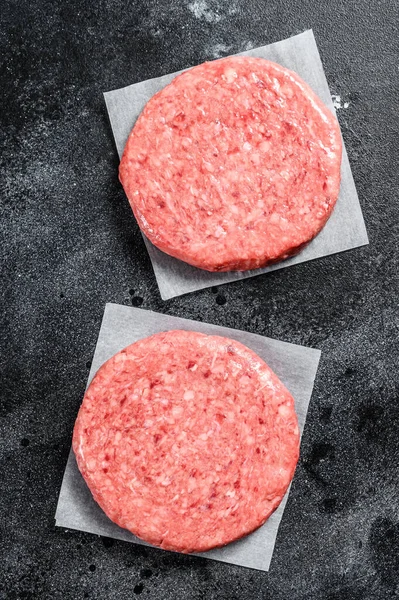 Rohe Burger Patties Hackfleisch Schwarzer Hintergrund Ansicht Von Oben — Stockfoto