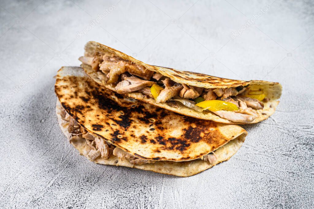 Cheesy Chicken roast Quesadilla. White background. Top view